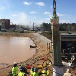 photo of the grantt power plant worksite - showing a small crane lifting equipment