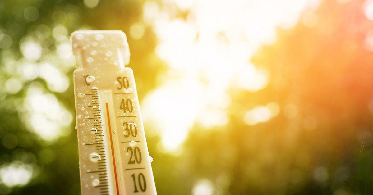 thermometer outdoors showing high temperatures in celsius
