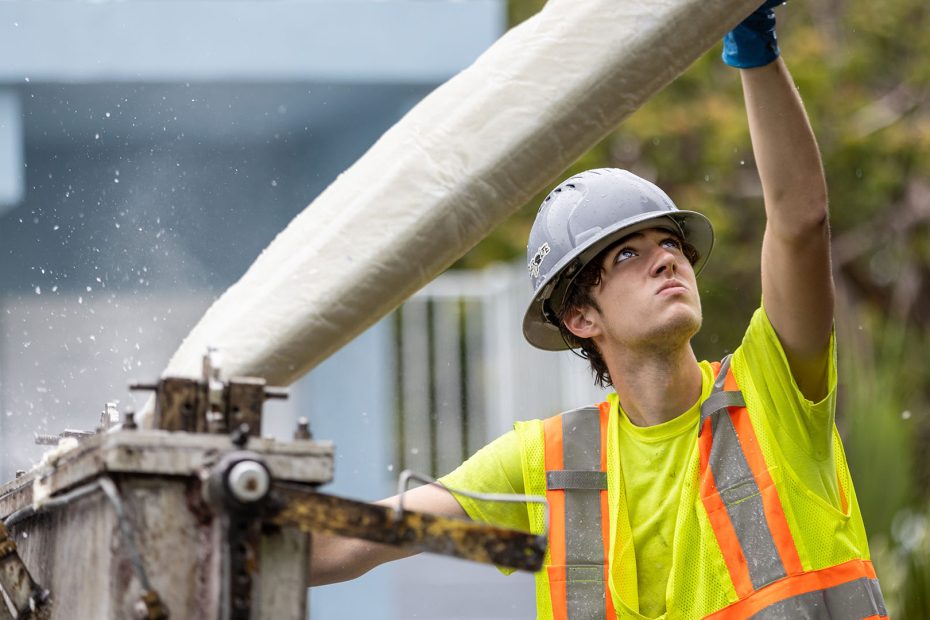 worker holding up CIPP