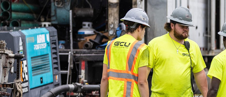 four workers in a group