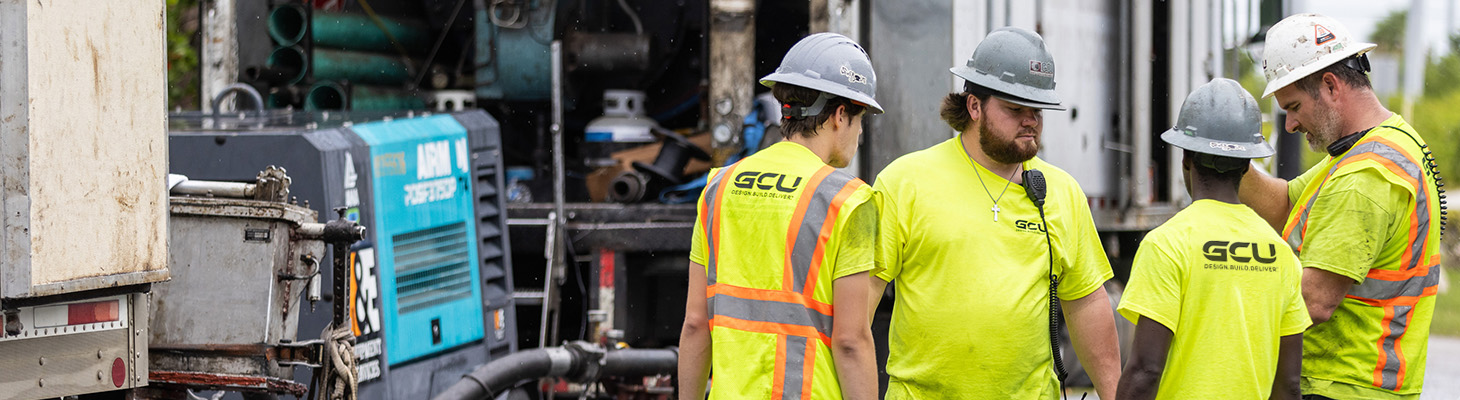 four workers in a group