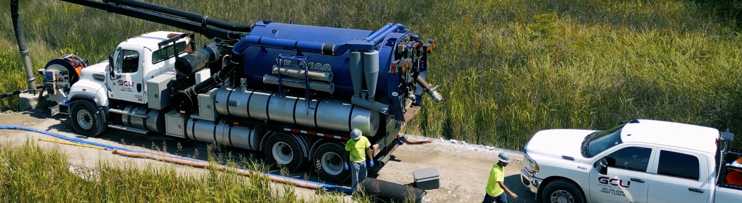 GCU work trucks in the field