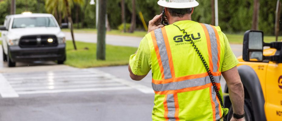 gcu worker on phone