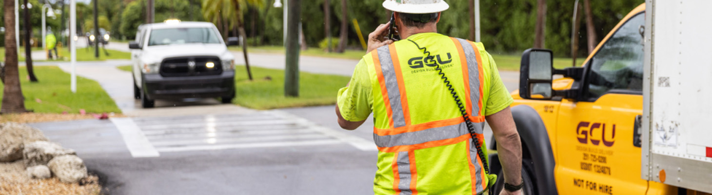 gcu worker on phone